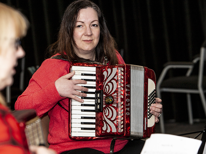 Adult with accordion