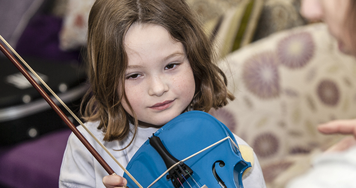 Child with fiddle