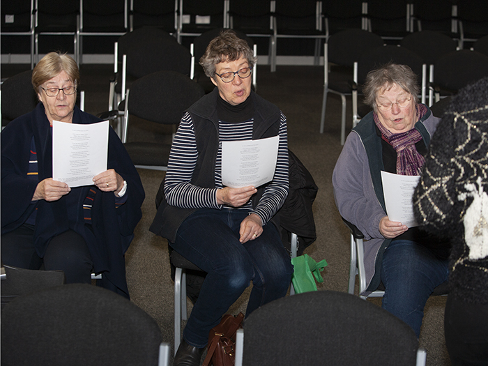 Folk song workship with ladies practicing